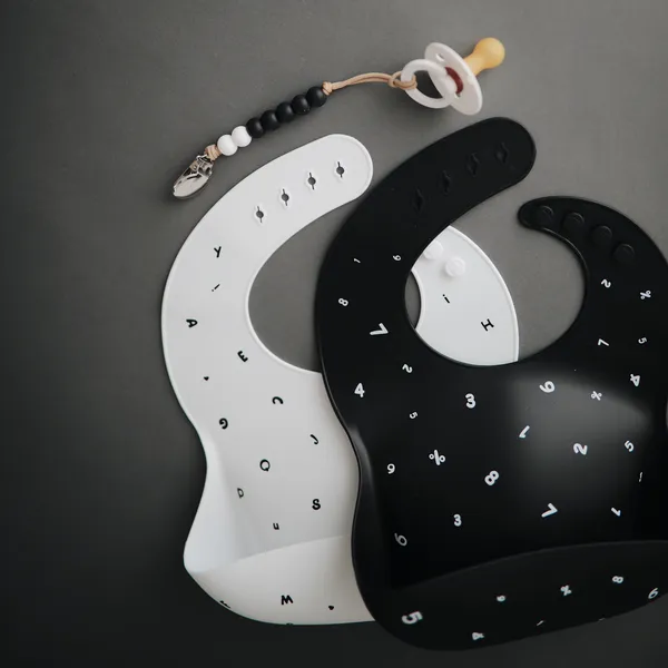 Mushie Silicone Baby Bib - Letters White